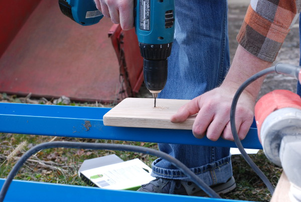 Drilling the birdhouse