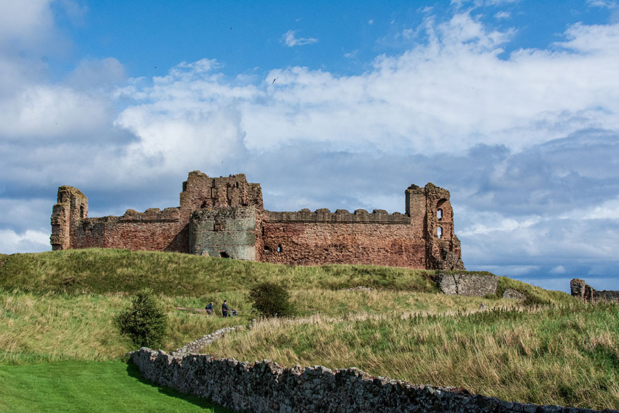 Tantallon Castle in North Berwick sits on the edge of a cliff overlooking the sea.