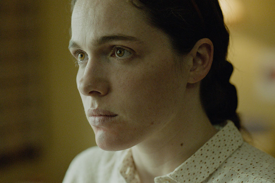 Close-up of Verena Altenberger in a dramatic scene from 'Die beste aller Welten,' an Austrian film ideal for learning Austrian German.