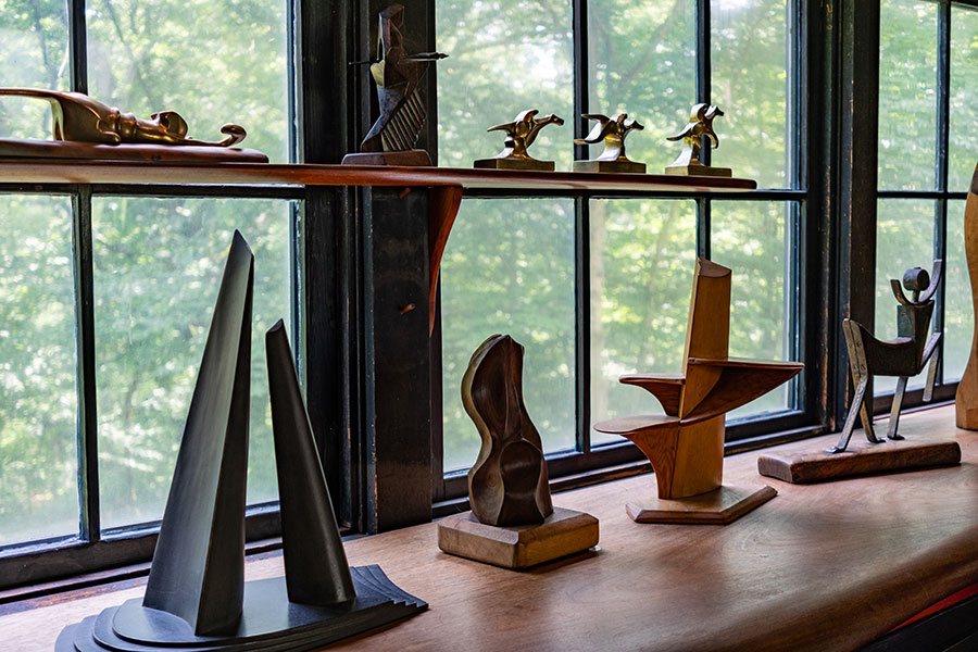 Collection of modernist wood sculptures by Wharton Esherick displayed in the studio at the Wharton Esherick Museum.